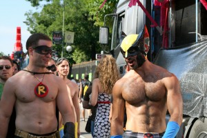 Two hot guys dressed as super heroes.