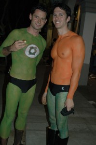 Two young men in body paint as the Green Lantern and Aquaman.