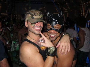 Two muscular young men in costume.