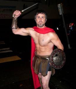 Young man dressed as a gladiator.